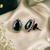Emerald royale halo studs