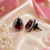 Royal ruby halo studs