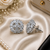 Rhodium finish crystal bloom studs