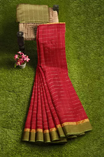 Brick red checked saree with light green border