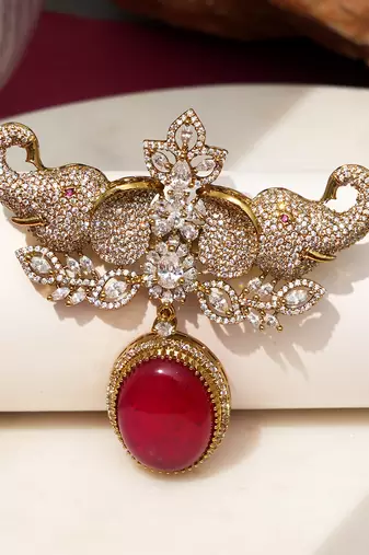 Gold plated red stone elephant head brooch