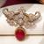 Gold plated red stone elephant head brooch