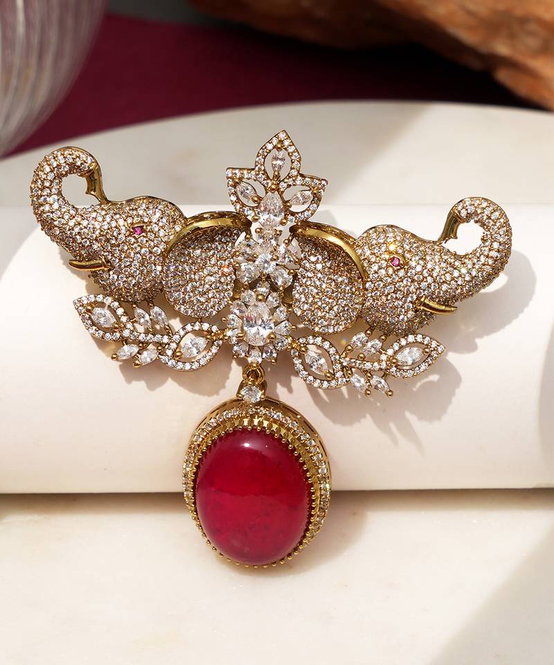 Gold plated red stone elephant head brooch