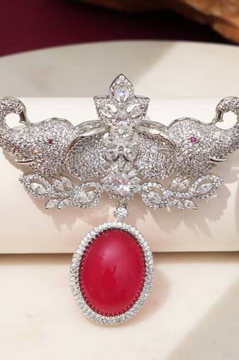 Rhodium plated ruby red stone elephant head brooch