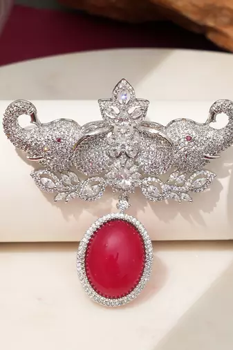Rhodium plated ruby red stone elephant head brooch