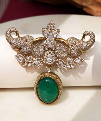 Gold plated emerald green stone elephant head brooch 1