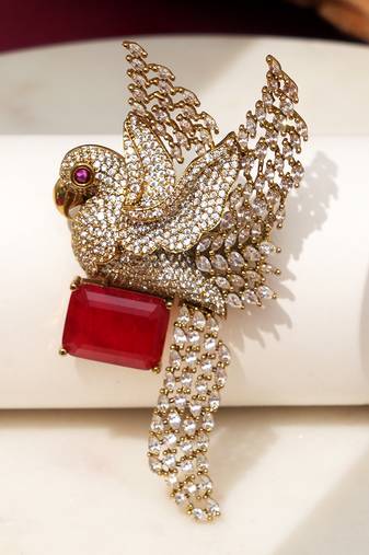 Gold plated ruby red stone bird motif brooch
