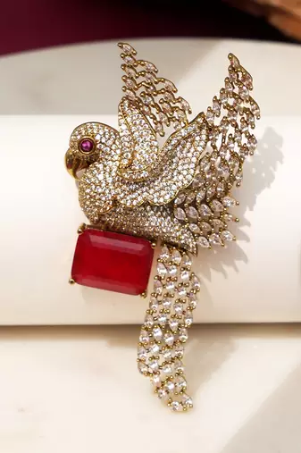 Gold plated ruby red stone bird motif brooch