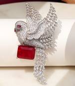 Rhodium plated ruby red stone bird motif brooch