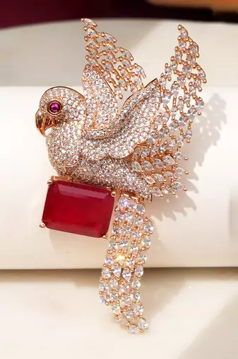 Gold plated red stone bird motif brooch