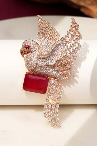 Gold plated red stone bird motif brooch
