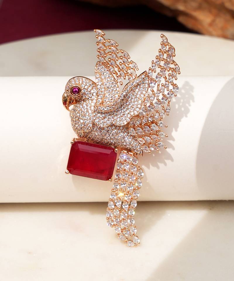 Gold plated red stone bird motif brooch