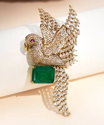Gold plated green stone bird motif brooch 1