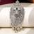 Silver plated green stone lion head brooch