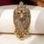 Gold plated green stone lion head brooch