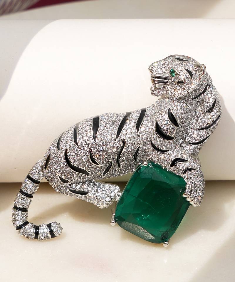 Silver plated green stone crouching tiger brooch