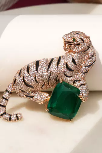 Gold plated emerald green stone crouching tiger brooch