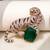 Gold plated emerald green stone crouching tiger brooch