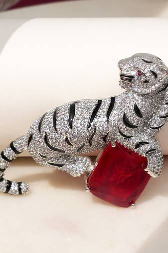 Silver plated red stone crouching tiger brooch