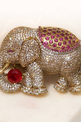 Gold plated red stone royal elephant brooch