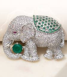 Silver plated green stone royal elephant brooch