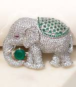 Silver plated green stone royal elephant brooch