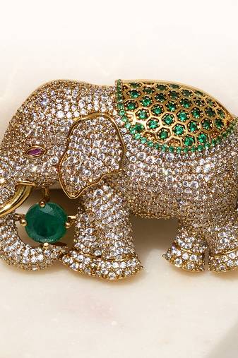 Gold plated emerald green stone royal elephant brooch