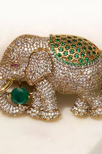 Gold plated emerald green stone royal elephant brooch