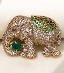 Gold plated emerald green stone royal elephant brooch