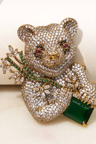 Gold plated emerald green stone bear motif brooch