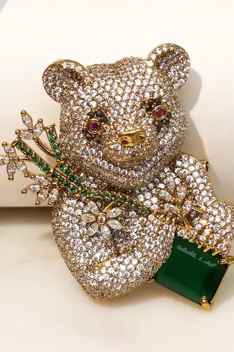 Gold plated emerald green stone bear motif brooch
