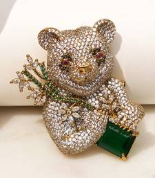 Gold plated emerald green stone bear motif brooch