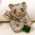 Gold plated emerald green stone bear motif brooch