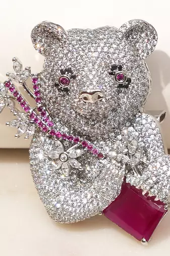 Silver plated purple stone bear motif brooch