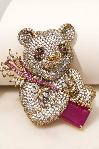 Gold plated purple stone bear motif brooch