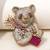 Gold plated purple stone bear motif brooch
