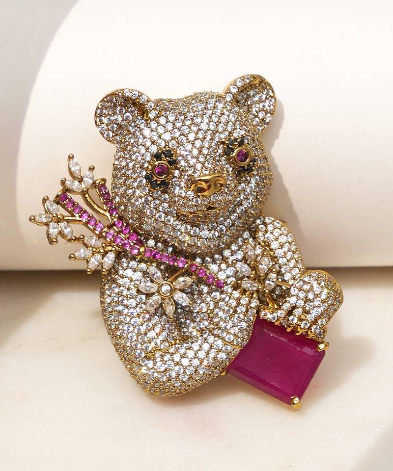 Gold plated purple stone bear motif brooch