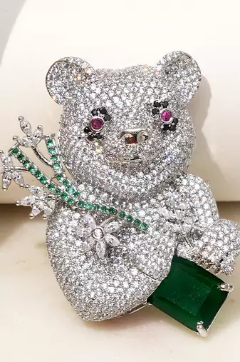 Silver plated emerald green stone bear motif brooch