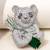 Silver plated emerald green stone bear motif brooch