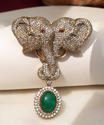 Gold plated green stone twin elephant brooch 1