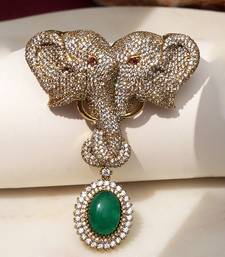 Gold plated green stone twin elephant brooch