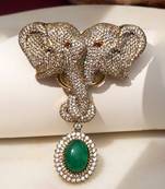 Gold plated green stone twin elephant brooch