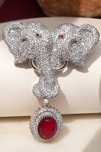 Silver plated ruby red stone twin elephant brooch