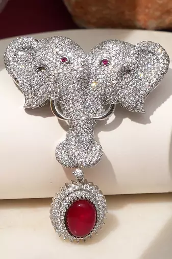 Silver plated ruby red stone twin elephant brooch