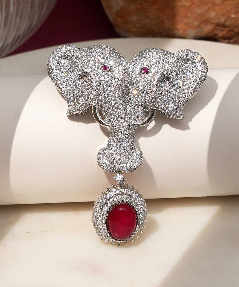 Silver plated ruby red stone twin elephant brooch