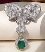 Silver plated green stone twin elephant brooch