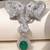 Silver plated green stone twin elephant brooch