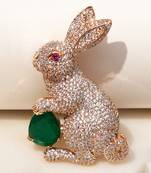 Gold plated emerald green stone rabbit motif brooch