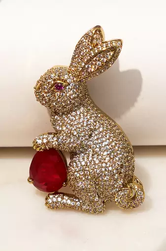 Gold plated red stone rabbit motif brooch