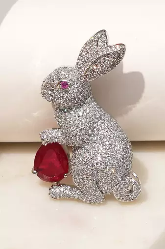 Silver plated red stone rabbit motif brooch
